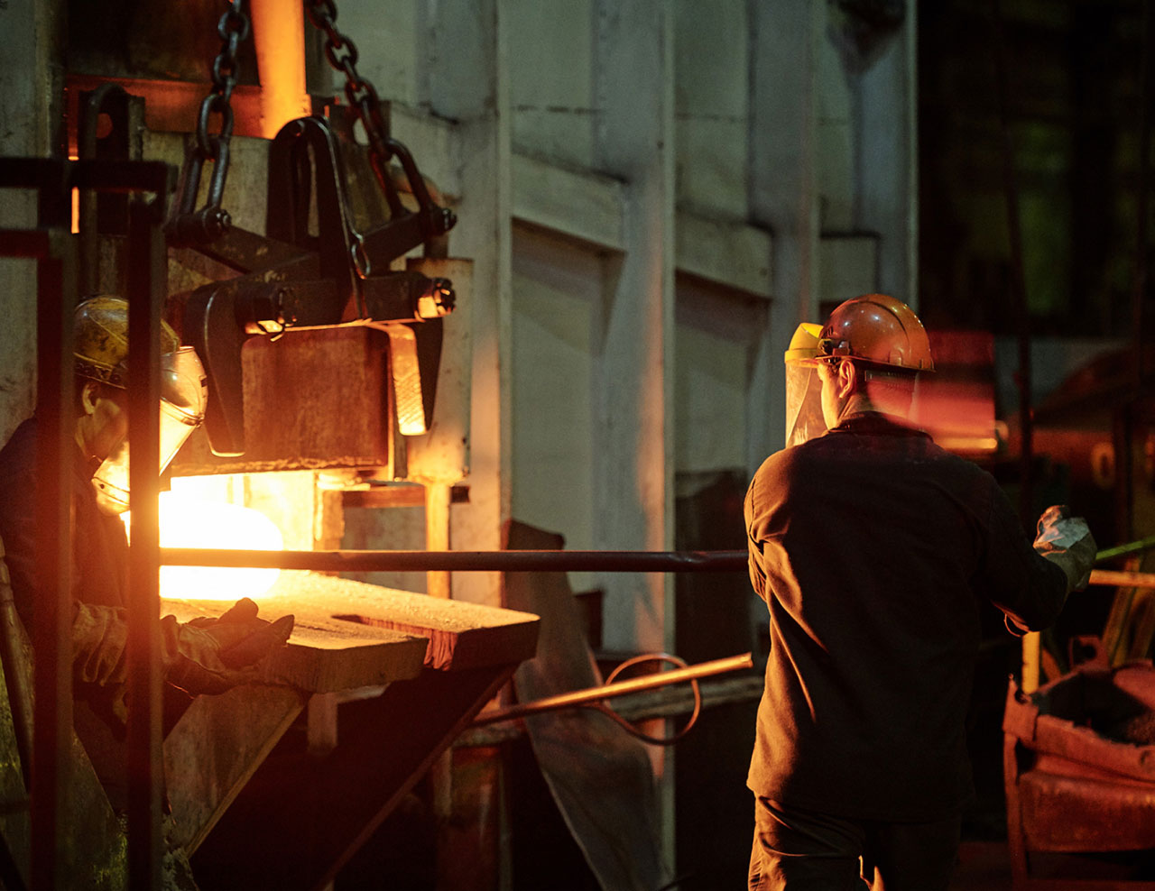 Men working in a steel mill